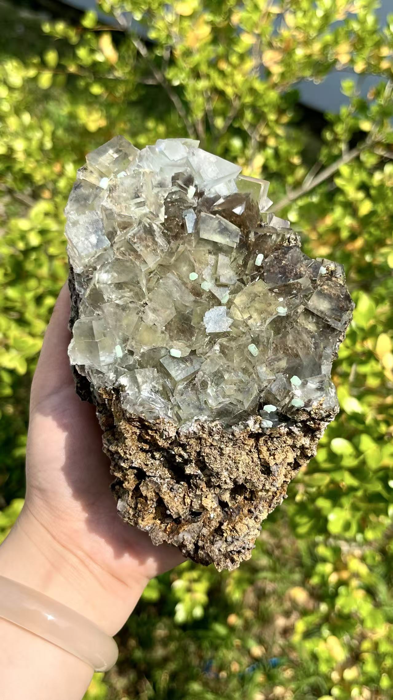 1. 0.7KG Ice Transparent Green Fluorite Crystal Specimen