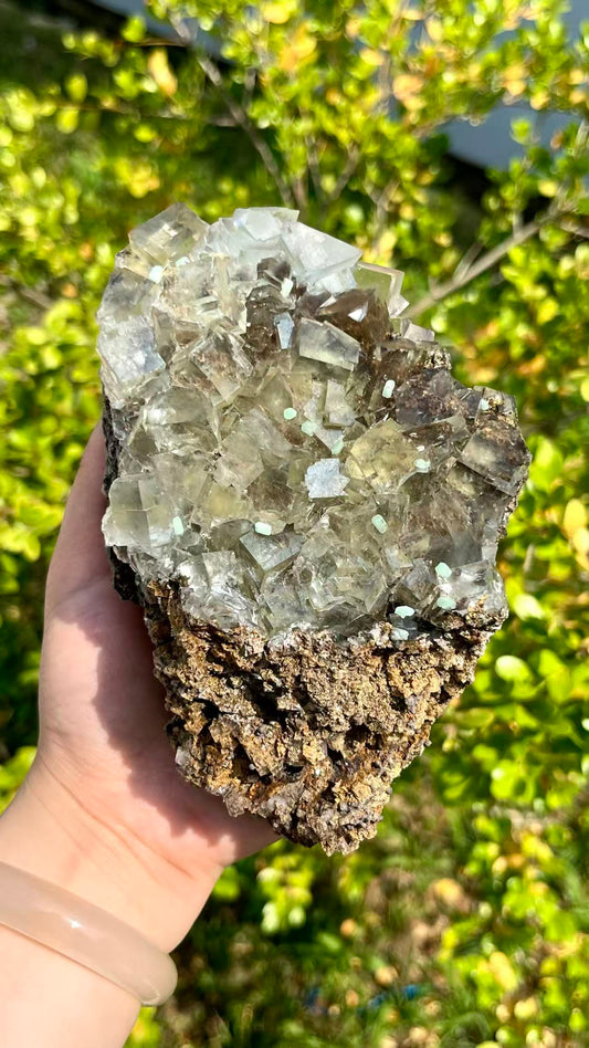 1. 0.7KG Ice Transparent Green Fluorite Crystal Specimen